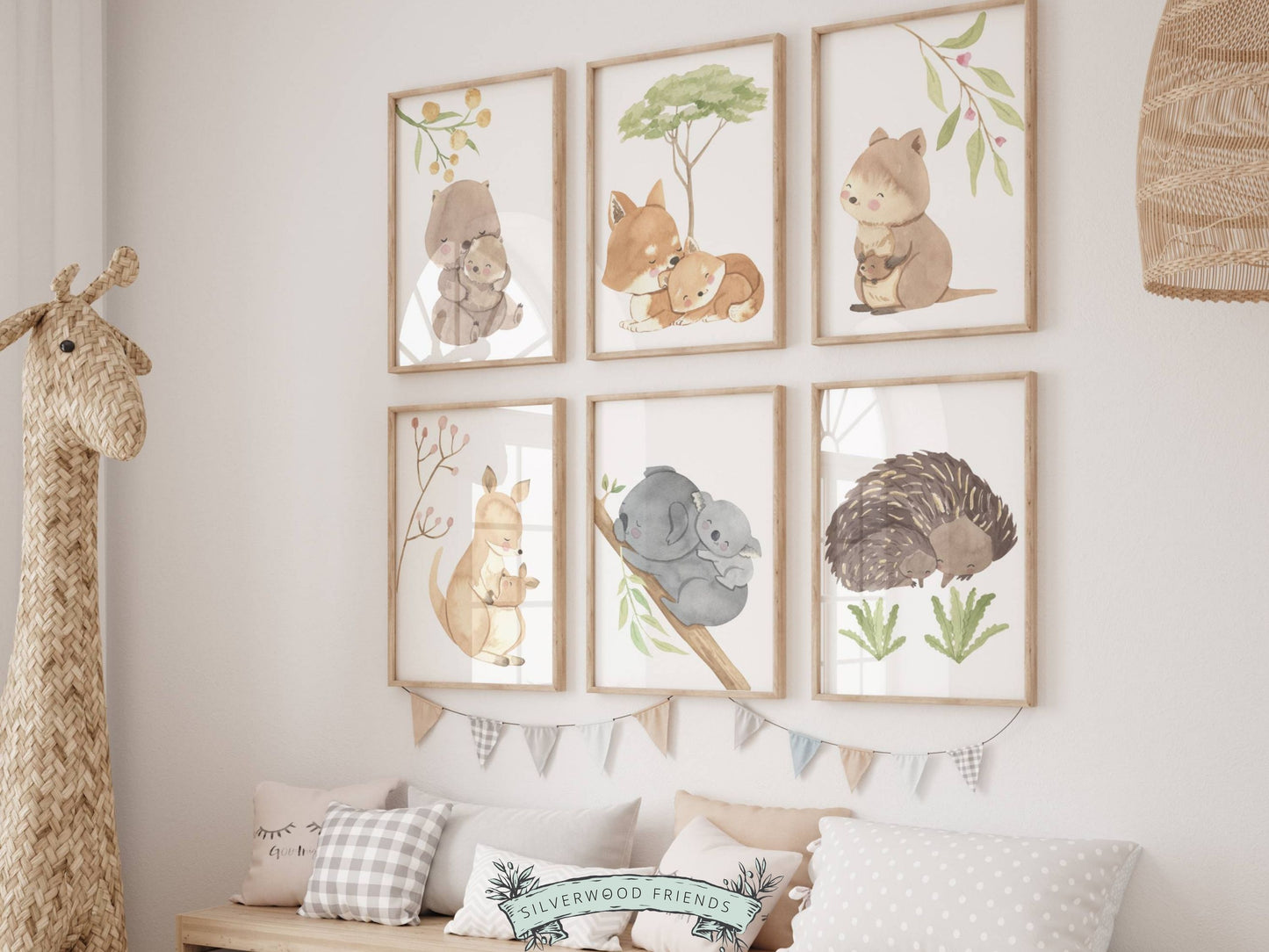 Bring a little bit of the Australian wilderness into your home with this Set of 6 Australian Animal Nursery Prints featuring a cute and cuddly Aussie animal mother and baby - Kangaroo, Koala, Wombat, Quokka, Fox and Echidna surrounded by beautiful watercolour Australian native flowers.