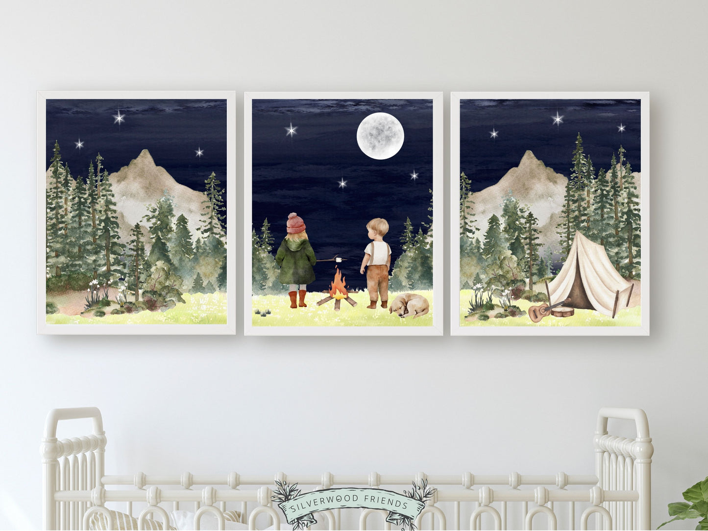 Our adorable Kids Camping Nursery Prints featuring watercolour woodland forest and mountain landscape with a boy, a girl and their dog by a campfire at night, are the perfect addition to your baby's woodland nursery decor and also make a lovely gender neutral baby shower gift.