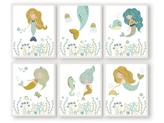 Set of 6 Pastel Mermaid Nursery Prints. These beautiful illustrations showcase mermaids swimming alongside a delightful array of sea creatures including a sea turtle, whale and fish adding a touch of magic to your baby girls nursery decor.