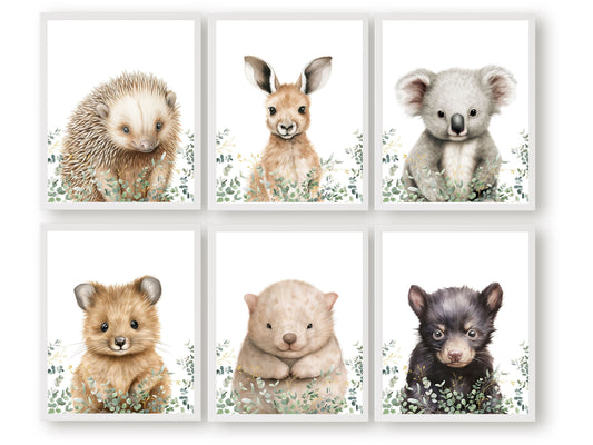 Australian Animal Nursery Print Set of 6 featuring a cute and cuddly Aussie animal - Baby Kangaroo, Koala, Wombat, Quokka, Tasmanian Devil and Echidna surrounded by beautiful Australian eucalyptus branches.