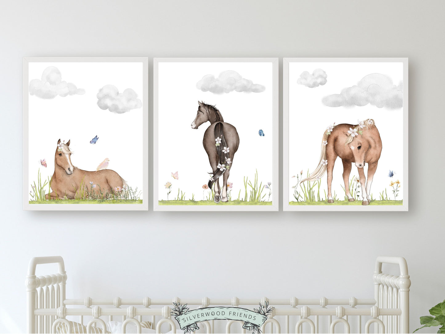 Set of 3 Horse Nursery Prints, showcasing serene watercolour scenes of horses in paddocks with beautiful wildflowers and butterflies. Ideal for your baby girls horse nursery decor or as a unique horse lovers baby shower gift or birthday gift.