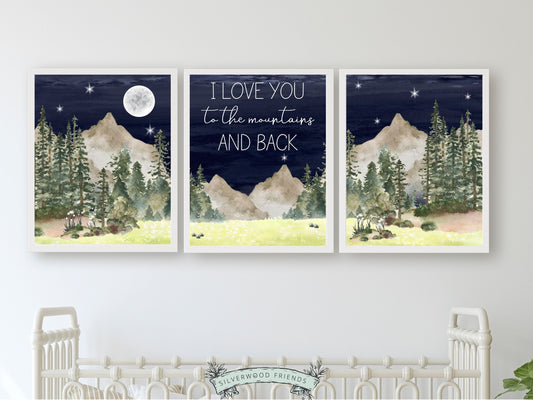 Transform your space into a serene mountain retreat with our enchanting Set of 3 Mountain Prints, featuring the quote, I love you to the mountains and back, set against a mountain and woodland forest landscape and starry night sky.