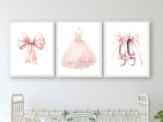 Set of 3 Princess Ballet Nursery Prints, showcasing a whimsical princess dress, delicate bow, and dainty slippers. Infuse her space with a sprinkle of fairy tale magic, perfect for a ballet inspired nursery or a princess themed bedroom