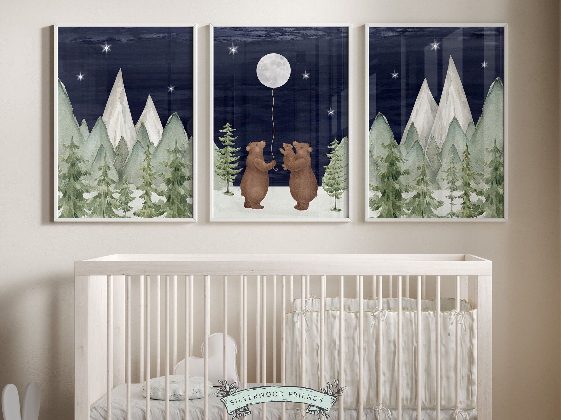 Set of 3 Bear Nursery Prints featuring a family of bears holding the moon under a starry night sky surrounded by a serene watercolor mountain and woodland forest landscape. Its ideal for your woodland nursery and makes a unique baby shower gift.