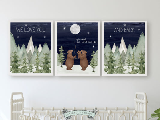 Set of 3 Bear Nursery Prints featuring a family of bears holding the moon under a starry night sky surrounded by a serene watercolour mountain and woodland forest landscape and quote, We love you to the moon and back.