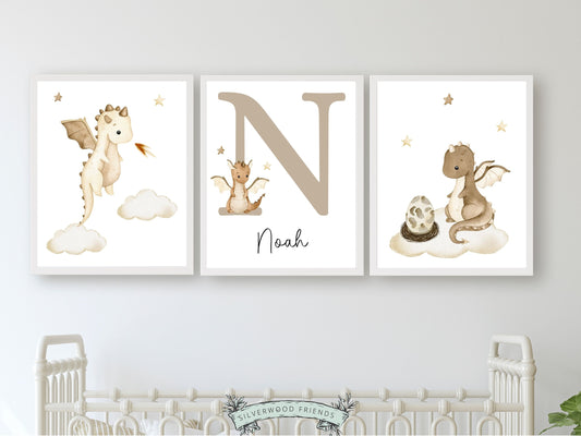 Our gorgeous Custom Baby Dragon Nursery Name Prints Set of 3 with beige watercolour dragons, clouds and stars, is perfect for your dragon nursery decor or fantasy theme nursery and also makes a unique gender neutral baby shower gift.