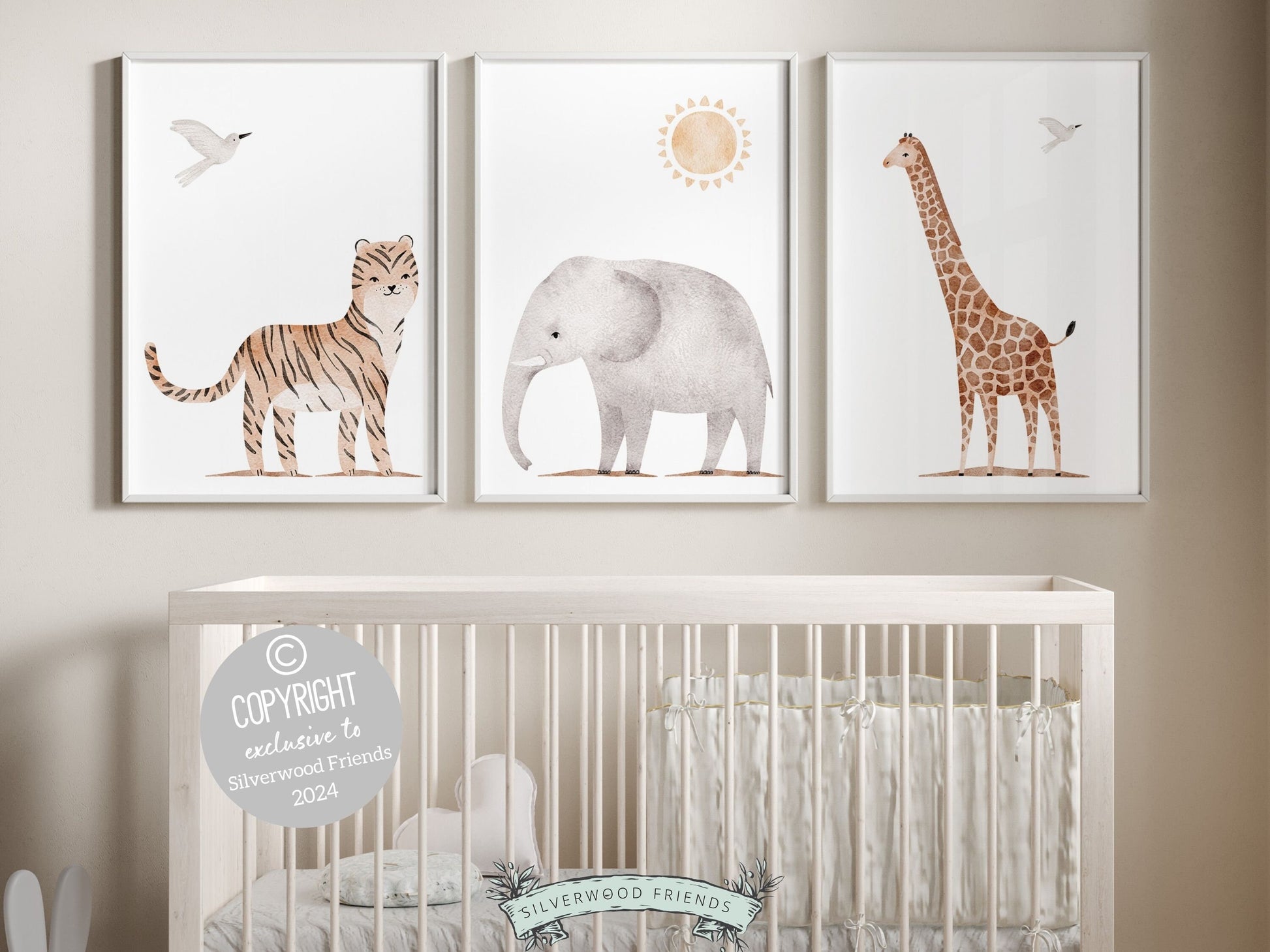 Safari Animal Nursery Prints Set of 3 featuring watercolor tiger, elephant and giraffe. These delightful prints are perfect for your safari nursery decor and also make a lovely gender neutral safari baby shower gift.