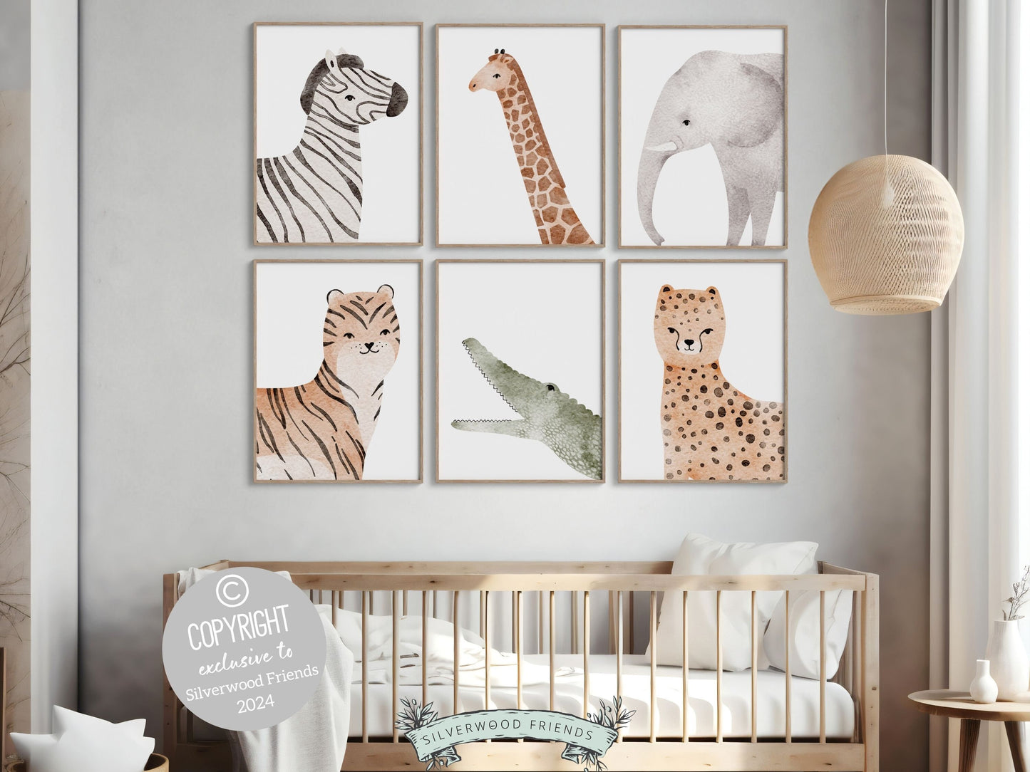 Safari Animal Nursery Prints Set of 6 featuring adorable watercolor safari animals. These delightful prints are perfect for your safari nursery decor and also make a lovely gender neutral safari baby shower gift.