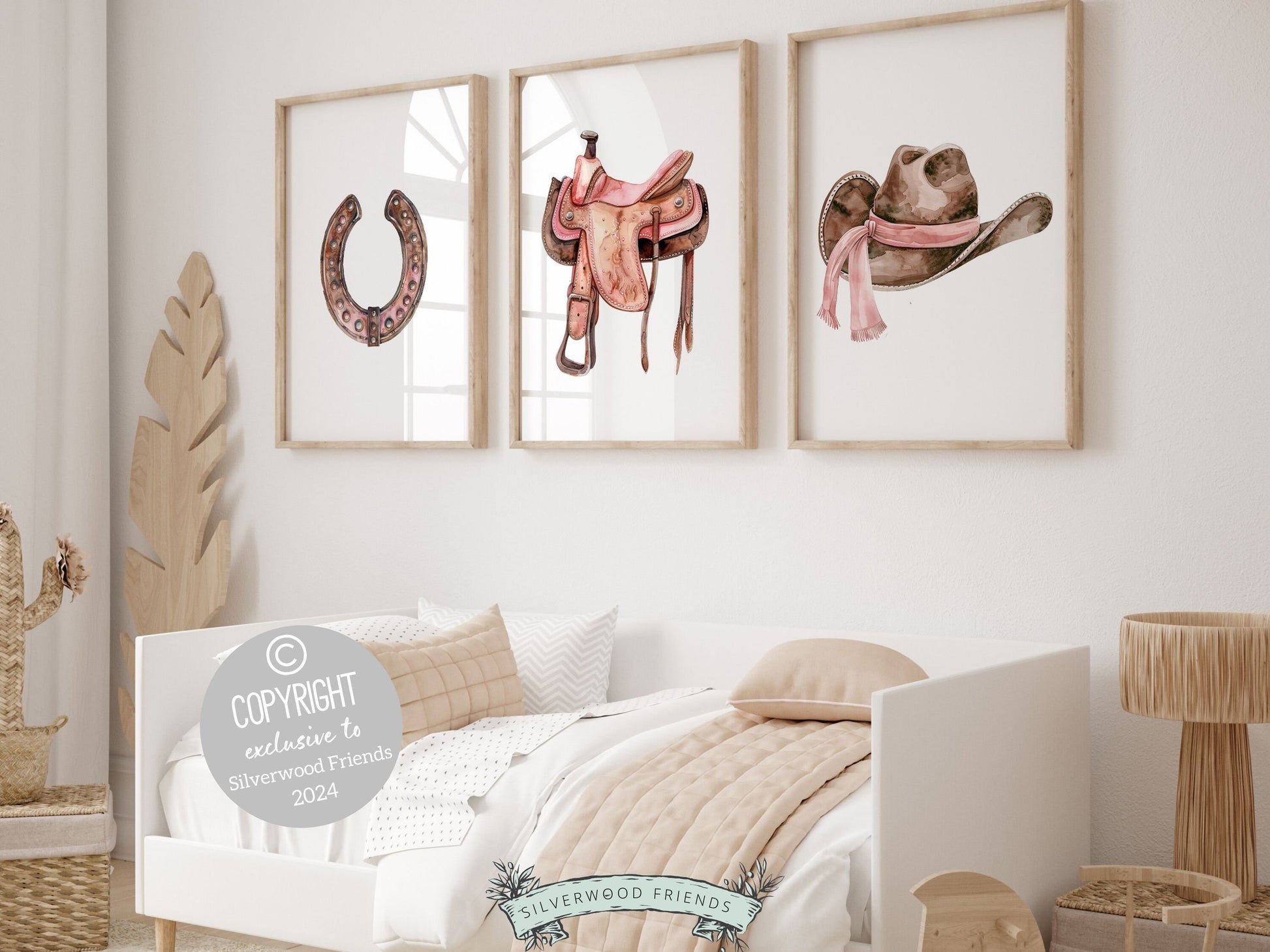 Set of 3 Cowgirl Nursery Prints showcasing watercolor cowgirl essentials in pink and brown hues. These charming artworks seamlessly blend rustic appeal into your cowgirl themed decor ideal for your nursery decor or as a unique baby shower gift.