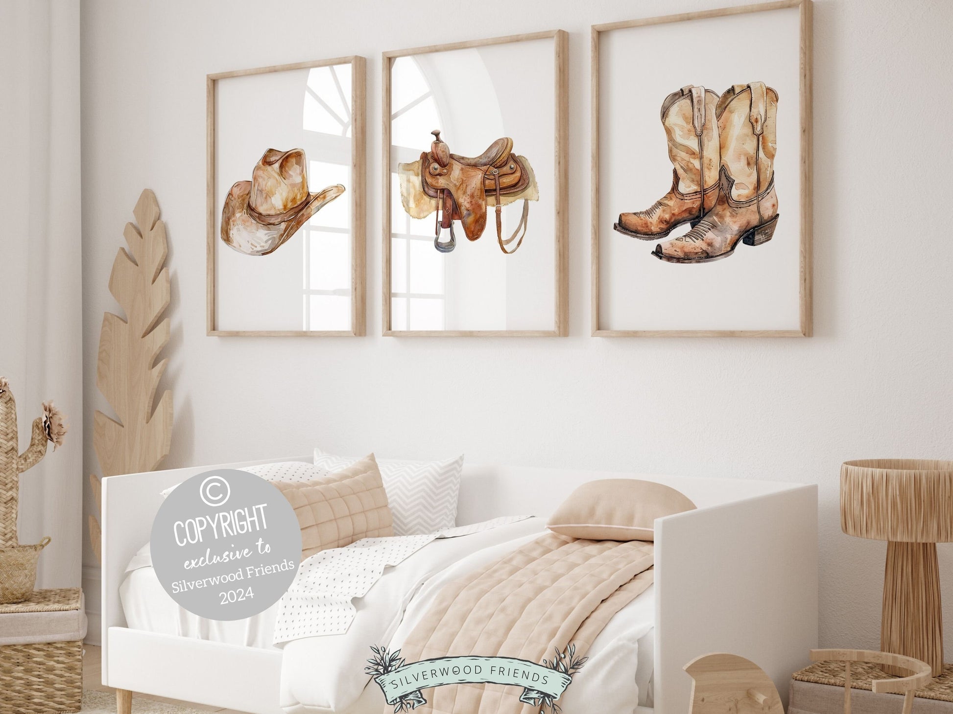 Set of 3 Cowboy Nursery Prints showcasing horse riding essentials in watercolor neutral brown hues. These charming prints seamlessly blend rustic appeal into your western themed decor, ideal for your nursery decor or as a unique baby shower gift.