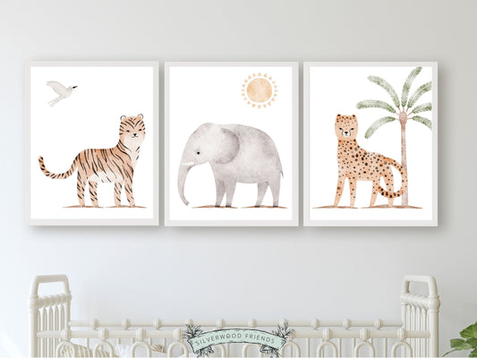 Safari Animal Nursery Prints Set of 3 featuring watercolour tiger, elephant and leopard. These delightful prints are perfect for your safari nursery decor and also make a lovely gender neutral safari baby shower gift.