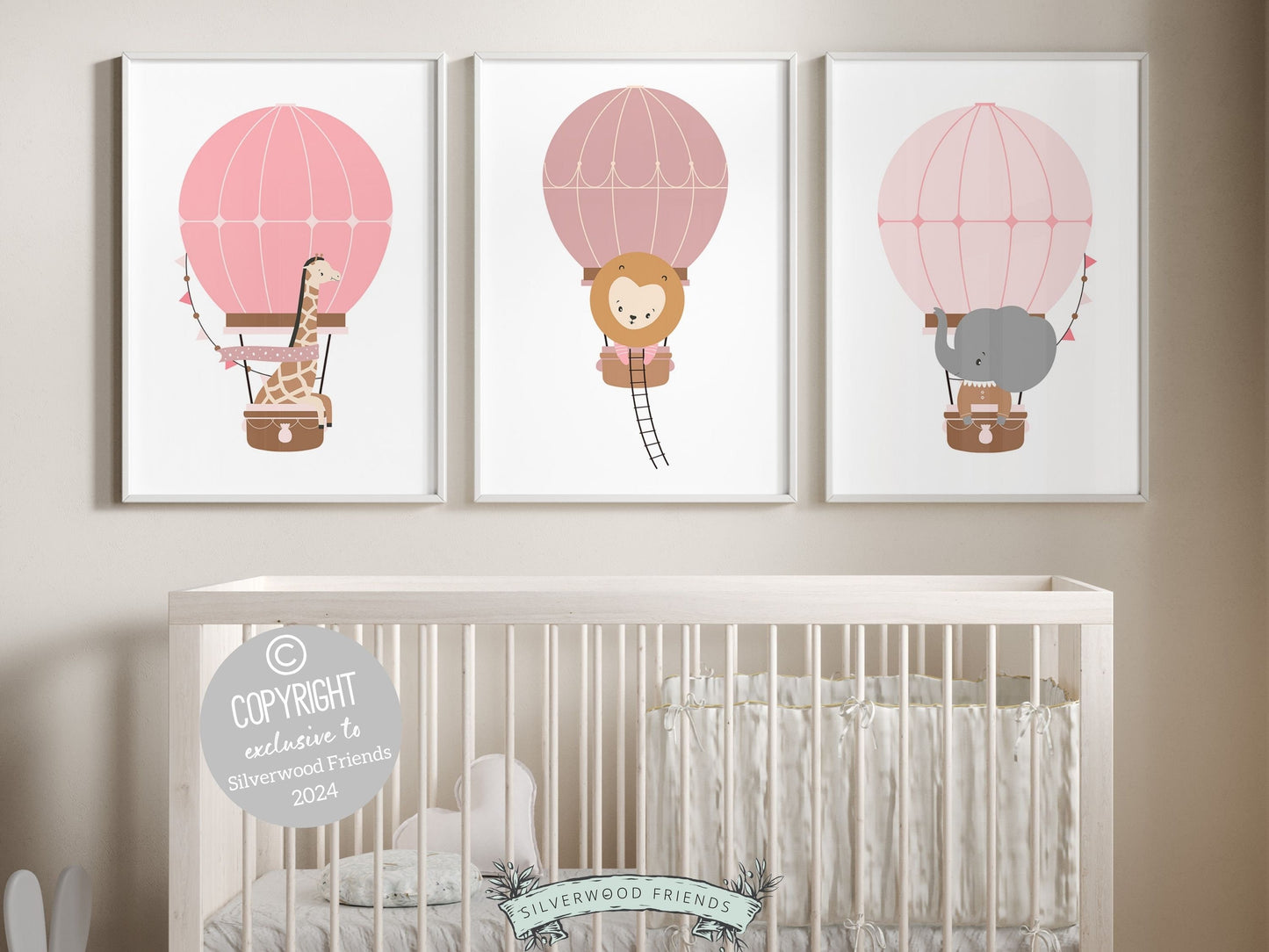 Hot Air Balloon Nursery Prints, featuring charming safari animals giraffe, lion and elephant in hot air balloons in soothing blush pink tones. Perfect for your baby girls adventure nursery and also as a unique and thoughtful baby shower gift.