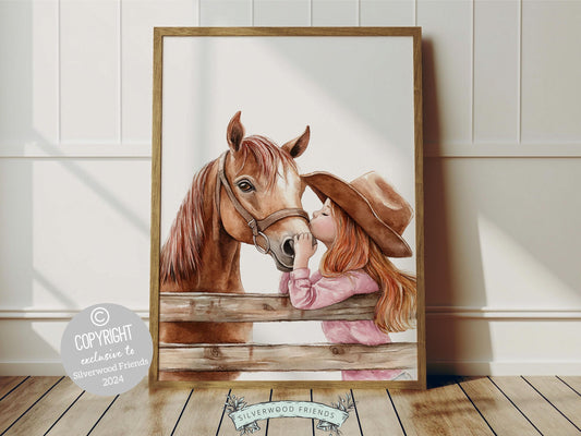 Watercolor digital print, depicting a red haired cowgirl kissing her beloved horse atop a paddock fence. This artwork enhances your cowgirl themed decor, perfect for your little ones space or as a baby shower gift for horse riding enthusiasts.