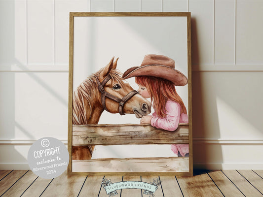 Digital print depicting a red haired cowgirl kissing her beloved horse atop a paddock fence. This artwork enhances your cowgirl themed decor, perfect for your little ones space or as a heartfelt baby shower gift for horse riding enthusiasts.