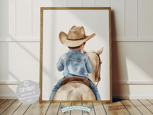 Cowboy Nursery Print, featuring an adorable little cowboy riding his trusty horse. Perfect for western themed decor and a thoughtful cowboy baby shower gift for horse loving families.