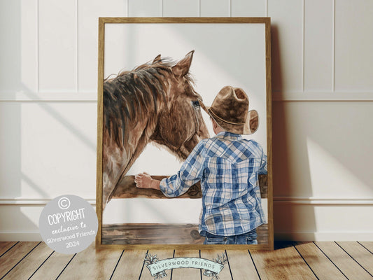 Cowboy Nursery Print, featuring an adorable little cowboy and his trusty horse at a paddock fence. Perfect for western themed decor and a thoughtful cowboy baby shower gift for horse loving families.