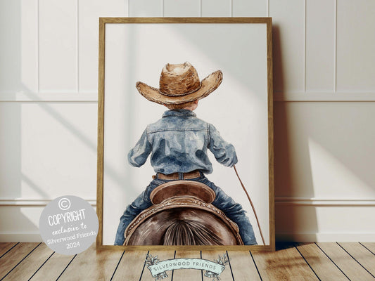 Cowboy Nursery Print, featuring an adorable little cowboy riding his trusty horse. Perfect for western themed decor and a thoughtful cowboy baby shower gift for horse loving families.