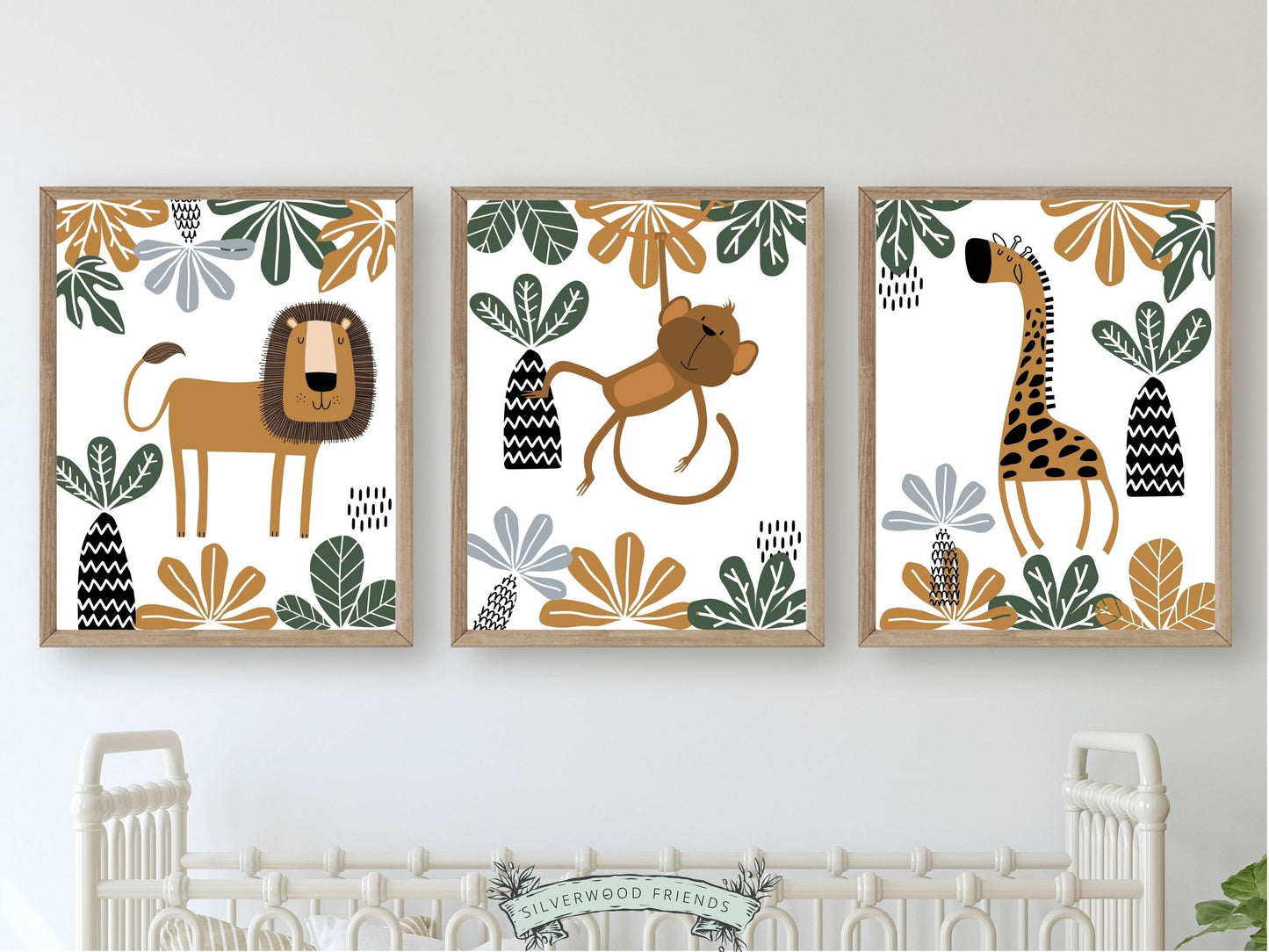 Our Boho Safari Jungle Prints with jungle animals lion, monkey and giraffe is set on a white background with tropical leaves frame, and is perfect for your jungle nursery decor or as a safari baby shower gift.