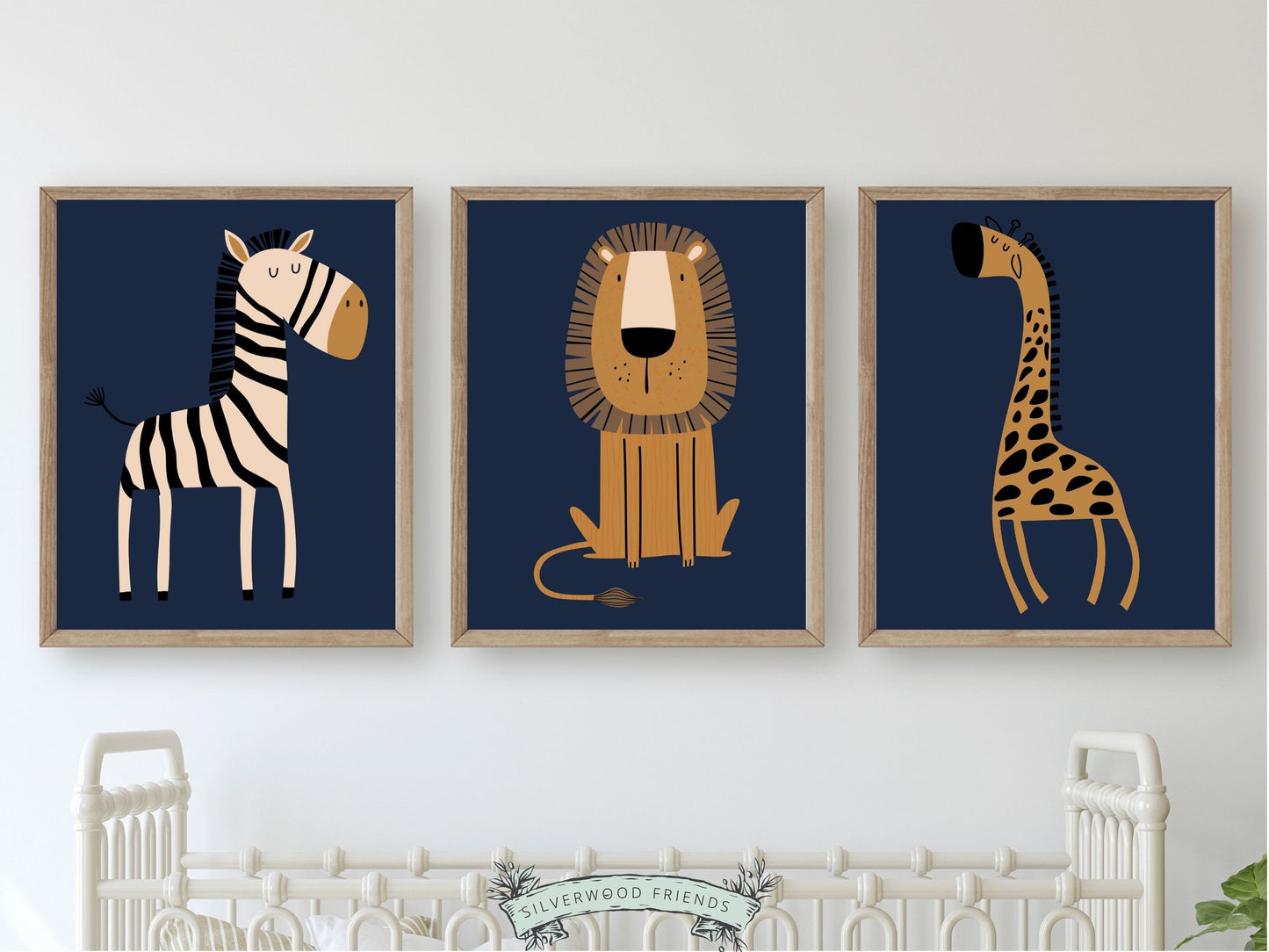 These Navy Blue Jungle Nursery Prints with jungle animals zebra, lion and giraffe is set on a navy blue background and perfect for your jungle nursery decor or as a thoughtful safari baby shower gift.