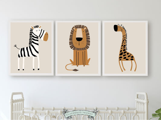 Our Boho Safari Animal Nursery Prints with jungle animals zebra, lion and giraffe is set on a beige background and perfect for your jungle nursery decor or as a new baby gift. It's part of our BEST SELLING safari nursery collection by Silverwood Friends.