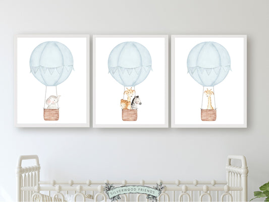 Let their imagination soar with these Safari Animals in Air Balloons Set of 3 Prints featuring watercolour safari animals in blue hot air balloon's.