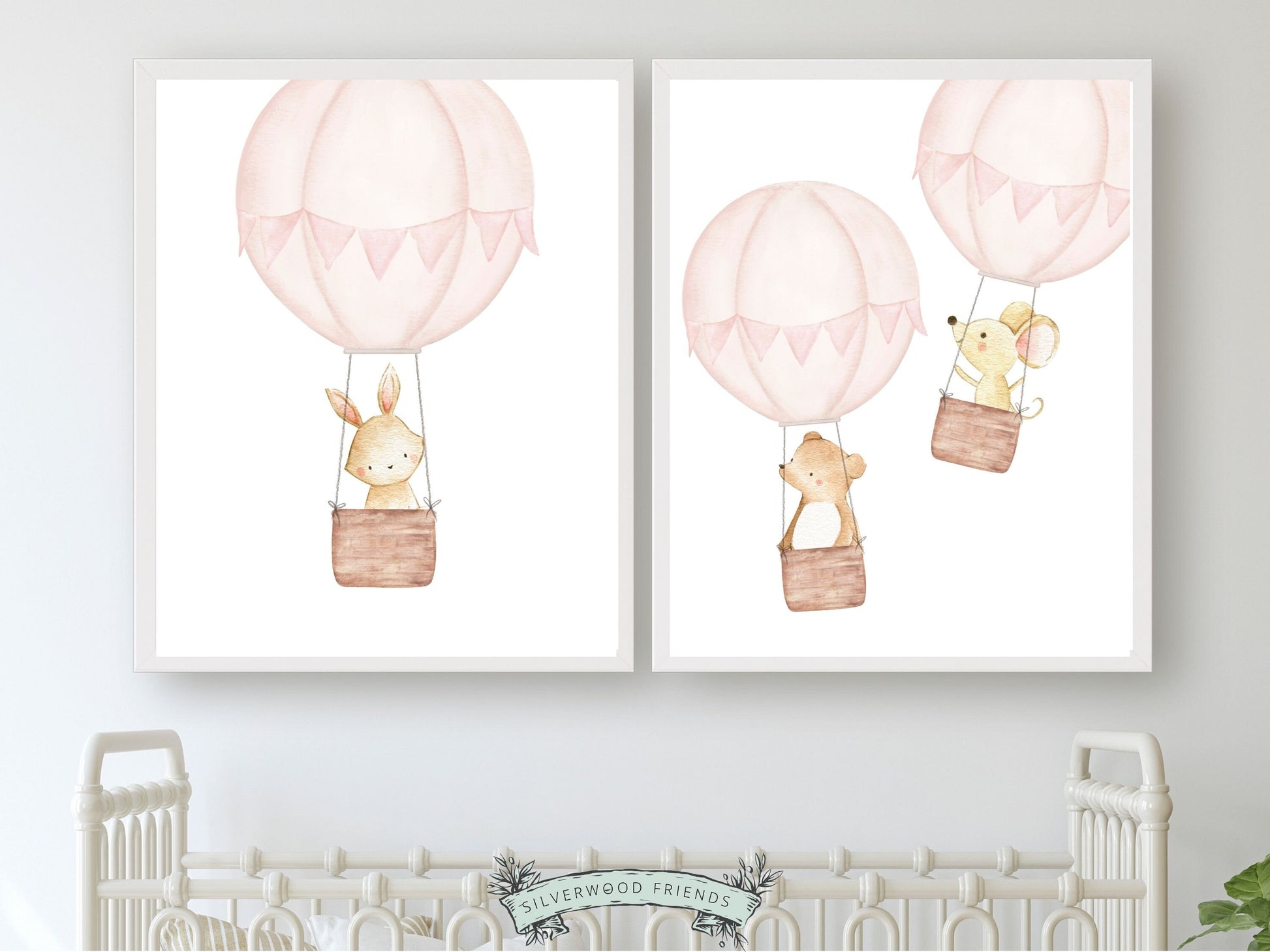 Let their imagination soar with our Set of 2 Pink Hot Air Balloon Nursery prints featuring watercolour woodland animals in pink hot air balloon's. Perfect for your woodland nursery decor or girls transport theme nursery.