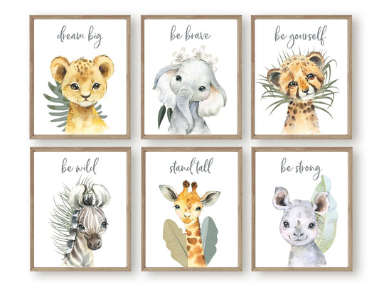 Our Boho Safari Animal Prints with baby safari animals lion, elephant, leopard, zebra, giraffe and rhino is set on a white background with tropical jungle leaves and is perfect for your jungle nursery decor or as a safari baby shower gift.