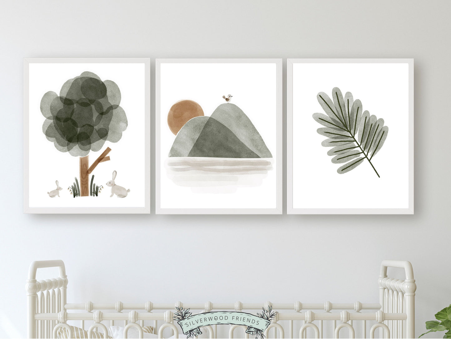 Our Green Boho Woodland Nursery Prints Set of 3 featuring watercolour woodland elements in a soothing green colour scheme, will instantly transform your boho nursery decor and is perfect as a new baby gift for a woodland baby shower or boho theme nursery.