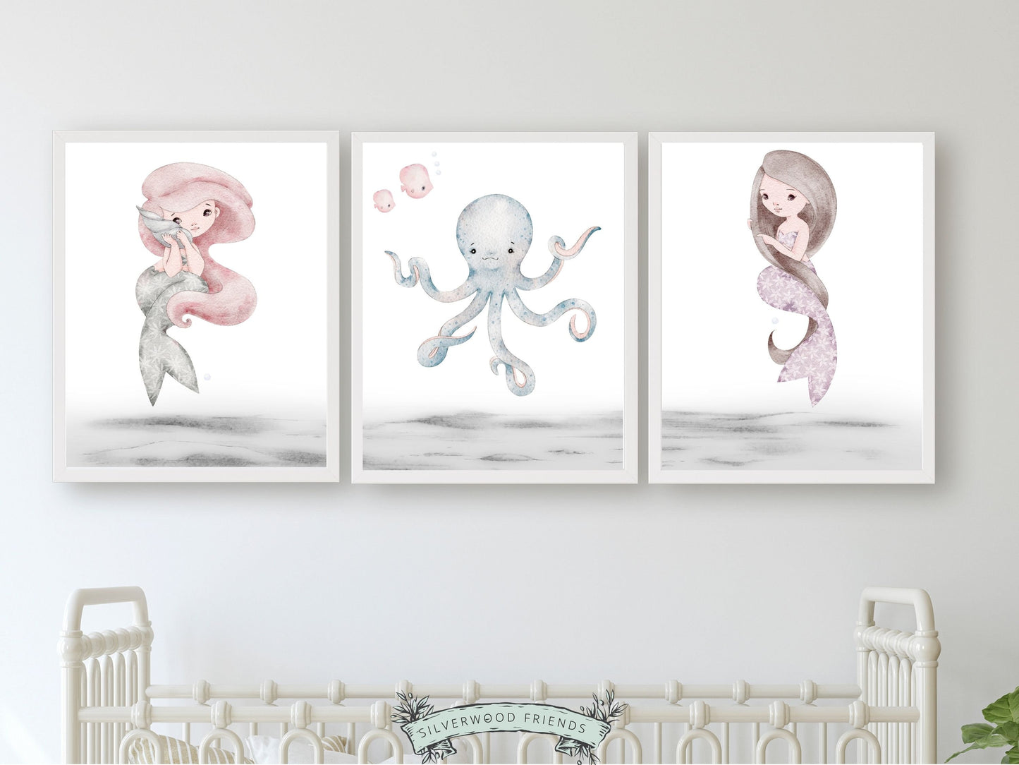 Create an enchanting underwater nursery oasis with our Pastel Mermaid Nursery Print Set of 3, featuring beautiful watercolour illustrations of mermaids swimming alongside an octopus to add a touch of magic to your baby girl's nursery decor.