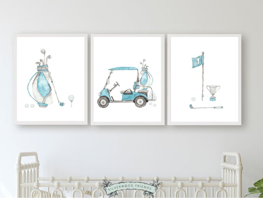 Elevate your baby boy's nursery decor with our Golf Nursery Print set of 3, featuring blue watercolour illustrations of golf balls, carts, and golf bags, providing the perfect decorative touch for your sports-inspired nursery decor or golf-themed baby shower.