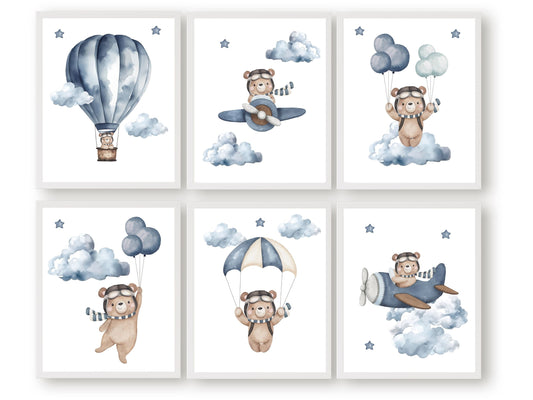 This delightful Teddy Bear Nursery Print Set of 6 showcases adorable watercolour teddy bears embarking on adventures amidst a dreamy star-studded sky, flying airplanes and skydiving through fluffy clouds.