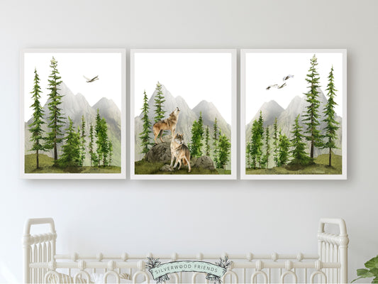 Transform your space into a serene mountain retreat with this enchanting set of 3 watercolour mountain and forest landscape prints with howling wolves. Ideal for adding a touch of natural beauty to your mountain nursery.