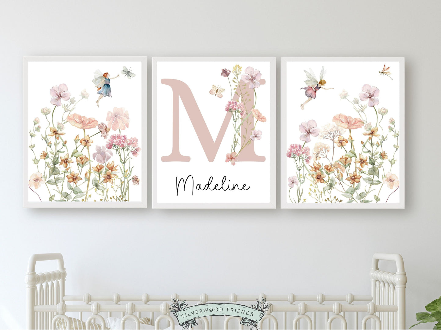 Our gorgeous custom wildflower fairy nursery name prints with watercolour wildflowers, butterflies and fairys with a pink custom name letter, is perfect as a custom nursery print set for your new baby or as a thoughtful and unique baby shower gift.