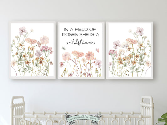 Our gorgeous Wildflower Nursery Print Set with watercolour wildflowers, butterfly's and quote "In a field of roses she is a wildflower" is perfect for your wildflower nursery decor and also makes a unique boho baby shower gift.