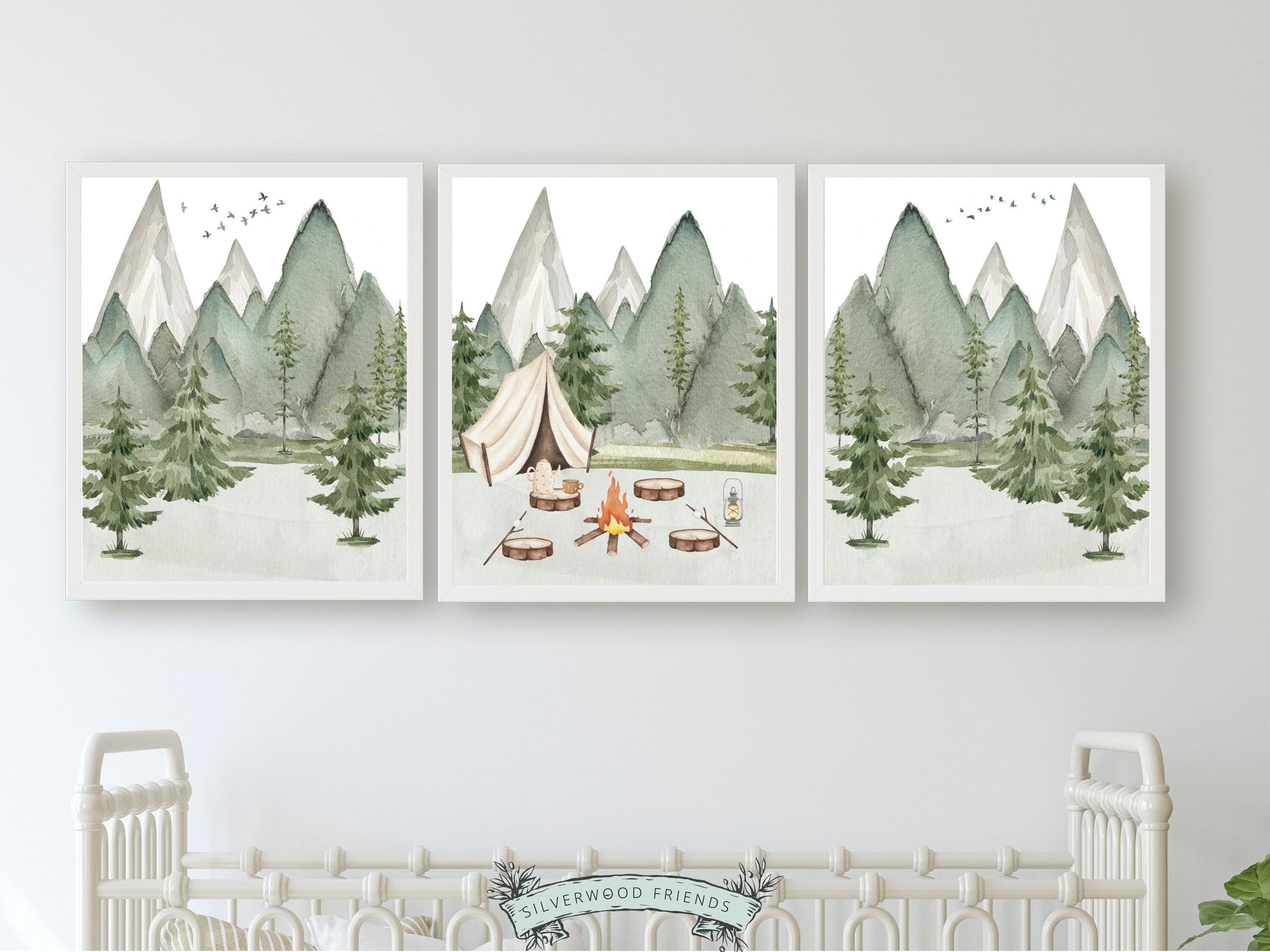 Our Camping Nursery Prints Set of 3 featuring watercolour campsite and forest mountain landscape is the perfect addition to your babys woodland nursery decor and also makes a lovely woodland baby shower gift.