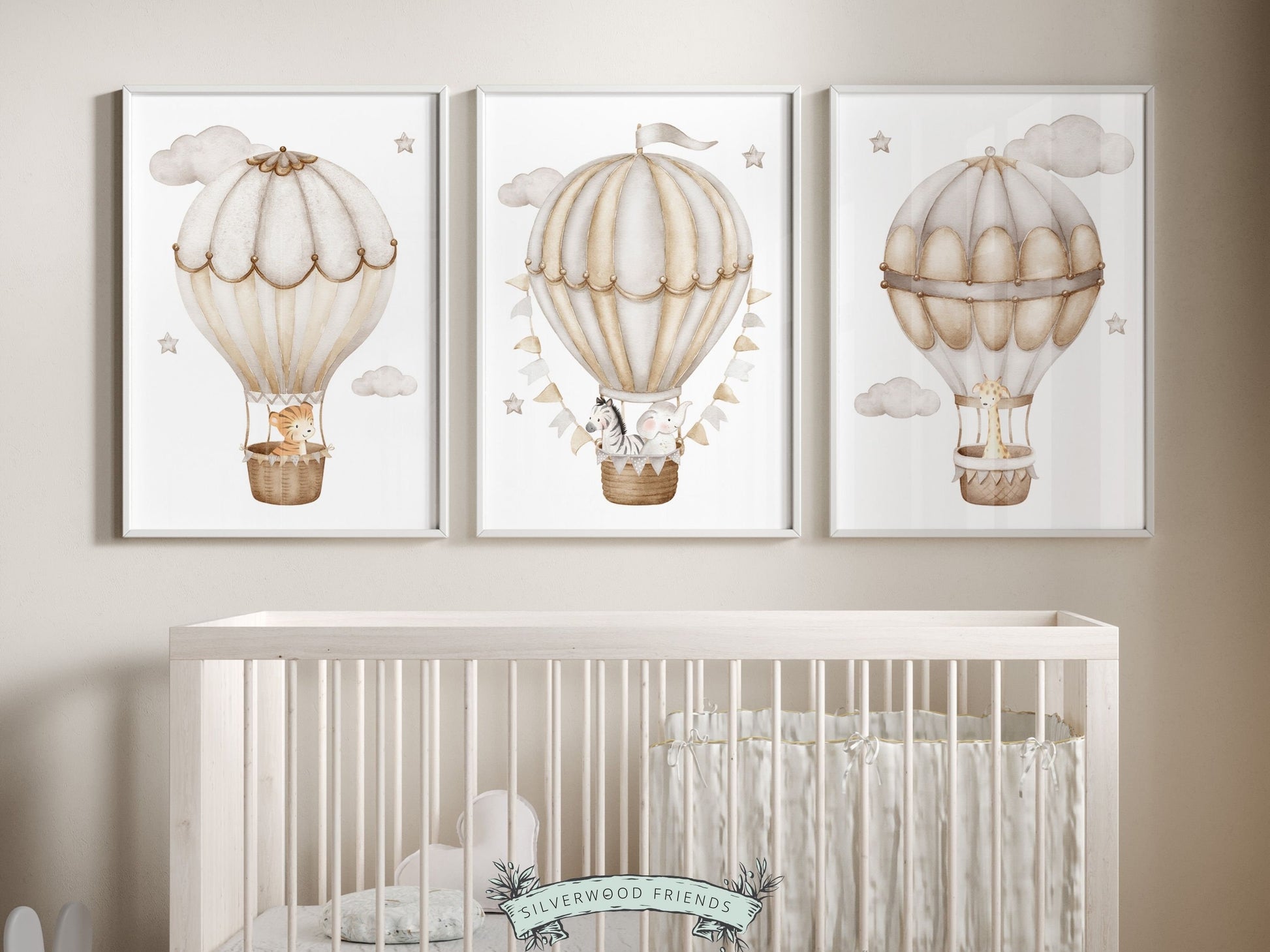 Let their imagination soar with our Hot Air Balloon Nursery Prints featuring watercolor safari animals in hot air balloons in a calming neutral color palette. Perfect for your safari nursery decor or transport nursery.