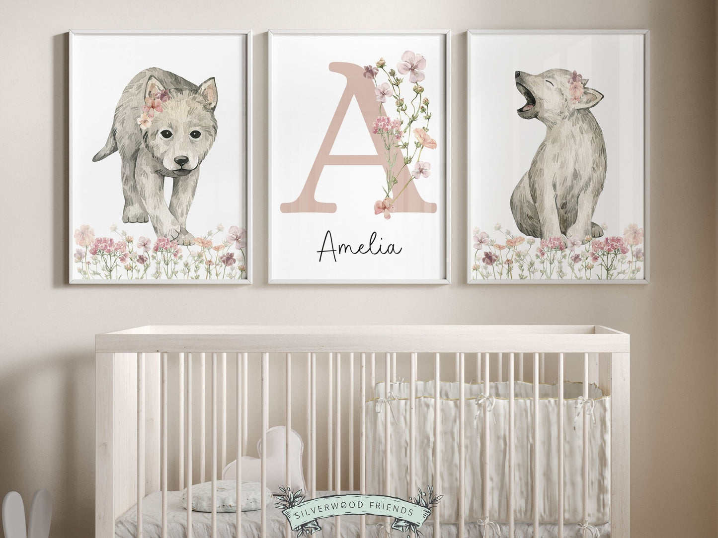 Our gorgeous custom wildflower nursery name prints with watercolor baby wolf cubs and pink wildflowers, are perfect as a custom nursery print set for your new baby girl and also makes a unique baby shower gift.