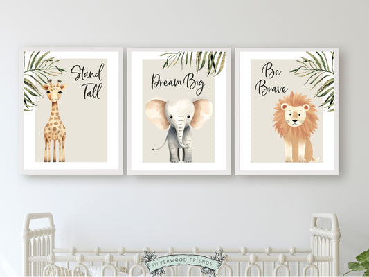 Our Safari Jungle Animal Nursery Prints featuring adorable watercolour illustrations of a giraffe, elephant and lion with jungle leaves and inspirational quotes "stand tall, dream big, be brave", is the perfect addition for your safari nursery decor.