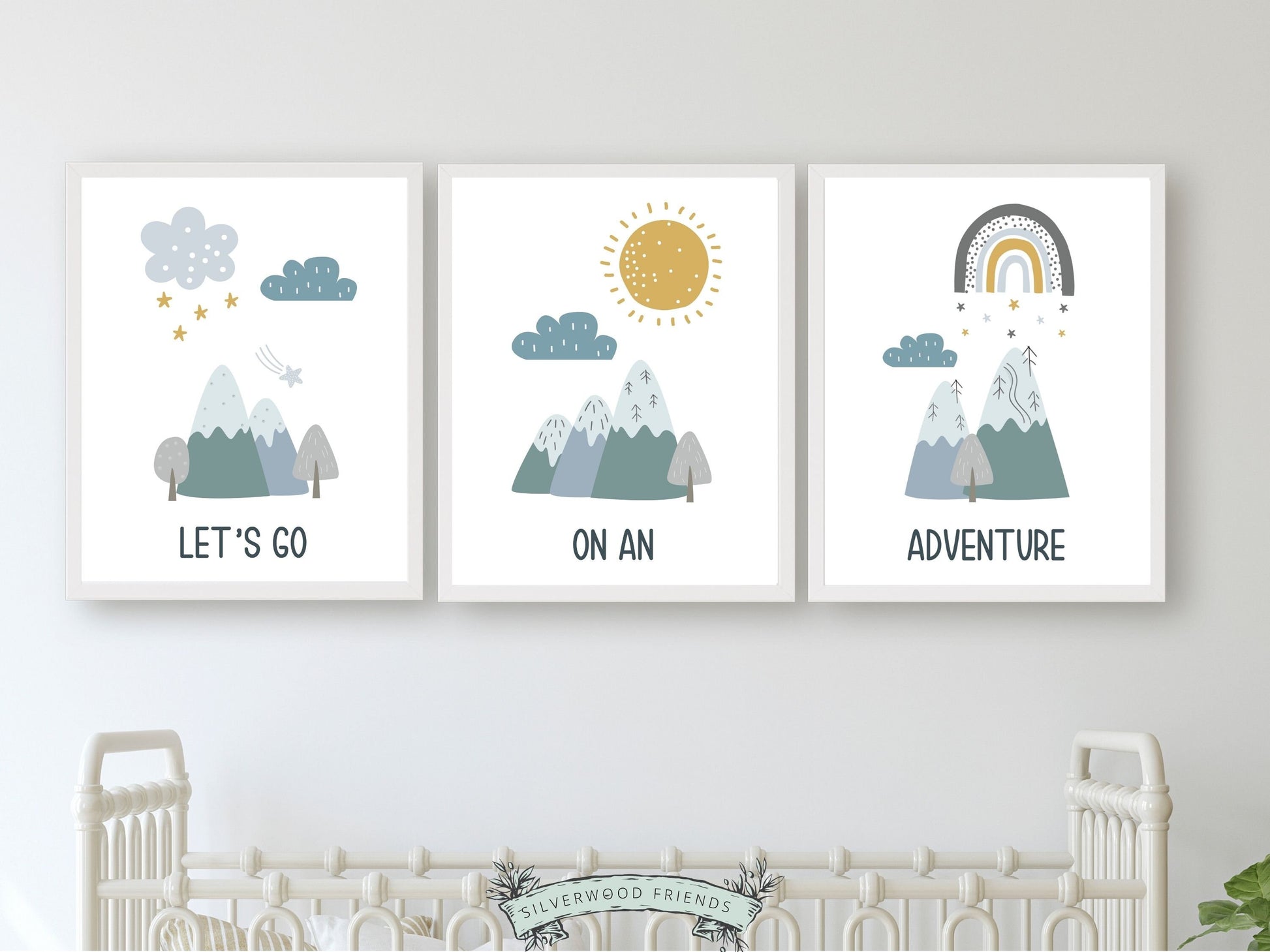 Our Set of 3 Mountain Adventure Nursery Prints, featuring Nordic mountains, a sun, clouds, stars, rainbow, and the quote "Let's go on an adventure" in tranquil blue and green tones will create a dreamy atmosphere in your little one's nursery. Perfect for your little exploring and also makes a unique baby shower gift.