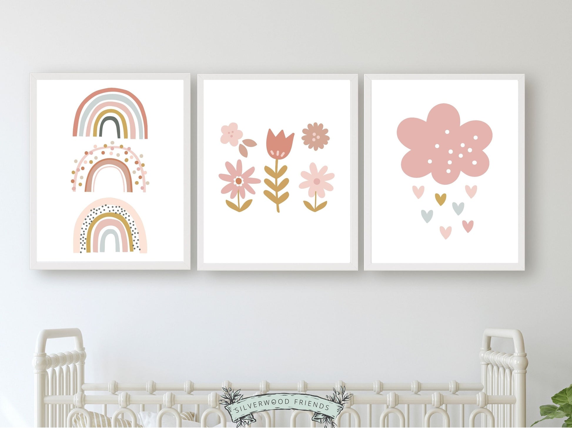 Our gorgeous Pink Boho Rainbow Nursery Prints with Scandi rainbow, wildflowers and love hearts is perfect for your baby girl's boho nursery decor and also makes a lovely baby shower gift.