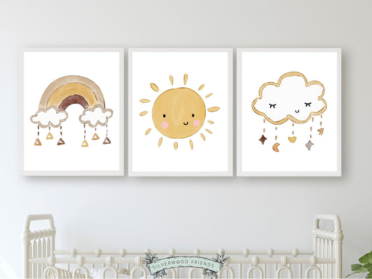 Set of 3 Boho Baby Nursery Prints. Delicately crafted watercolour rainbow, sun and cloud adorned with whimsical stars will infuse a harmonious and dreamy ambiance, making it an enchanting gender neutral baby shower gift.