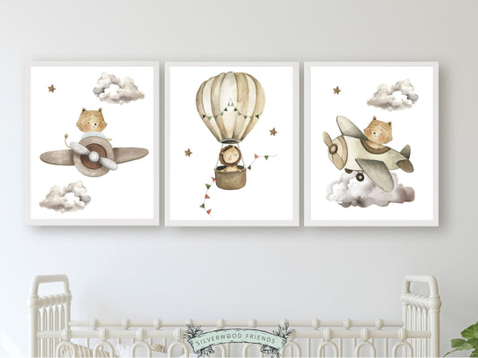 Let their imagination soar with our Safari Adventure Nursery Prints featuring watercolour safari animals in a hot air balloon and airplanes in a calming neutral colour palette.