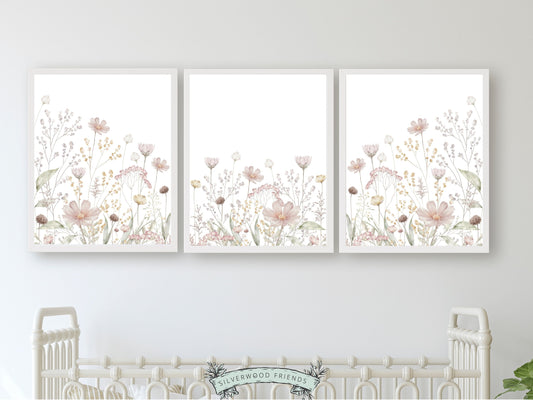 Set of 3 Wildflower Nursery Prints, adorned with a watercolour wildflower meadow that adds a touch of nature to your baby girls wildflower nursery. With its versatile charm, this set is ideal for your baby girls nursery decor and also makes an adorable baby shower gift or house warming gift