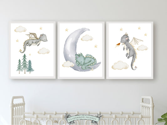 Set of 3 Baby Dragon Nursery Prints featuring watercolour baby dragons, moon and stars, will spark their imagination and create a calm and cosy atmosphere. Its perfect for your dragon nursery decor or fantasy theme nursery and also makes an adorable gender neutral dragon baby shower gift.