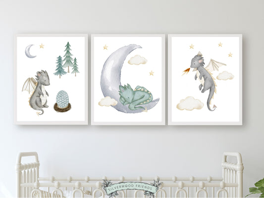 Set of 3 Baby Dragon Nursery Prints featuring watercolour baby dragons, moon and stars, will spark their imagination and create a calm and cosy atmosphere. Its perfect for your dragon nursery decor and also makes an adorable dragon baby shower gift.