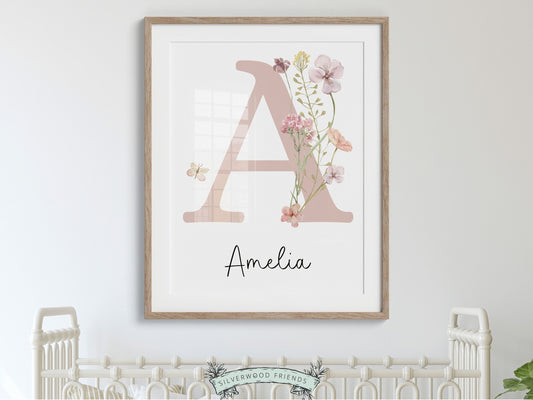 Our gorgeous custom wildflower nursery name print with watercolour wildflowers and butterflies is perfect as a custom name nursery print for your new baby or as an adorable baby girl's baby shower gift.