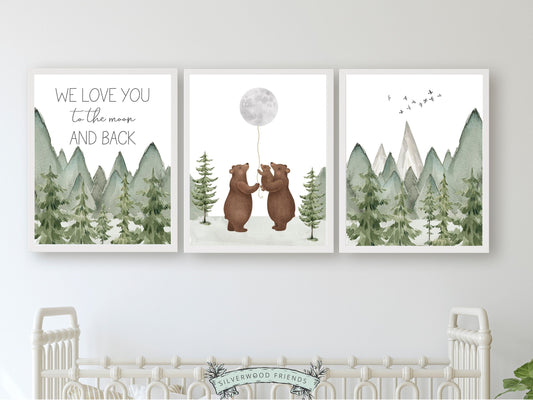 <p>Set of 3 Bear Nursery Prints featuring a family of bears holding the moon and quote We love you to the moon and back and set against a watercolour mountain and woodland forest landscape. Ideal for your woodland nursery and makes an adorable baby shower gift.