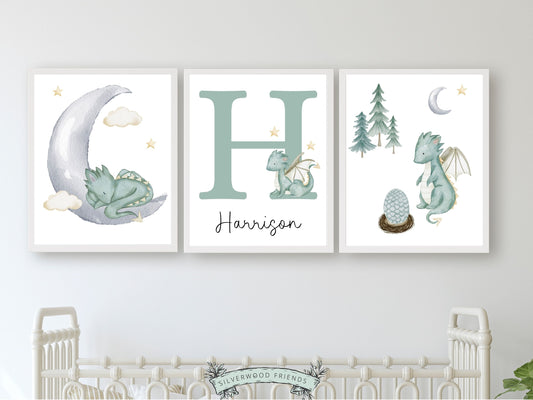 Custom Baby Dragon Nursery Name Prints Set of 3 with watercolour dragons, moon, clouds, and woodland forest trees, is perfect for your dragon nursery decor or fantasy theme nursery and also makes a unique gender neutral baby shower gift.