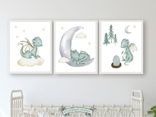 Set of 3 Baby Dragon Nursery Prints featuring watercolour sage green baby dragons, moon and stars, will spark their imagination and create a calm and cosy atmosphere. Its perfect for your dragon nursery decor and also makes an adorable dragon baby shower gift.